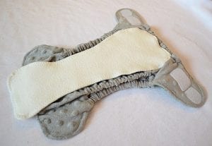 Grey cloth diaper with a filter. 