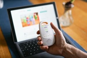 Baby Monitor: Monitors are compact devices for monitoring your baby. The image shows a baby monitor with a screen displaying a live feed of a sleeping baby.
