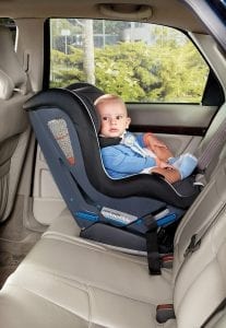 A baby setting on a high-quality convertible car seat designed for babies. This best convertible car seat features a comfortable cushioned car seat, adjustable straps, and a secure five-point harness system. This convertible car seat is built with a sturdy frame ensuring optimal safety during travel. 