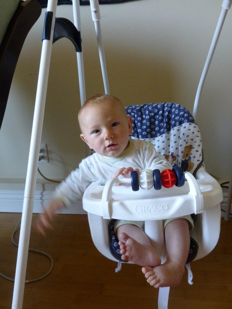 A child in a swing.