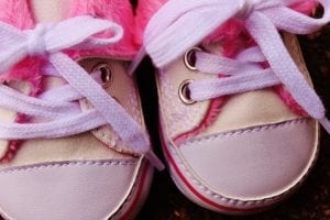 Adorable pink canvas shoes for babies.