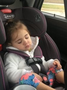 Graco car seat: A little girl using Graco all-in-one convertible car seat.