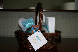 There is a basket. This might be a gift set from pampers based on the tag. 