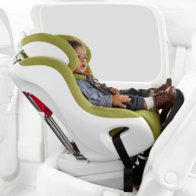 This image showcases a smiling baby boy comfortably seated in a sleek white Clek Foonf car seat, designed specifically for toddlers and kids. With Clek Foonf's advanced safety features and ergonomic design, the Clek Foonf provides peace of mind for parents and a cozy, secure ride for their precious passengers. Invest in the best for your child's safety and comfort with Clek Foonf. Clek Foonf is great.