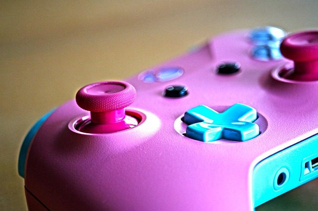 controller in pink and blue