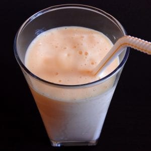 Best Papaya Smoothie - In a blender, combine the papaya, milk, cinnamon, and ice. Process the mixture at a high speed until it becomes thick and smooth.
