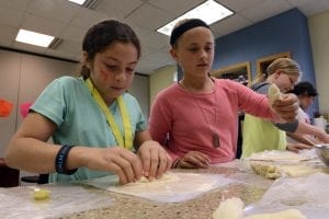 Students cooking delicious homemade meals.