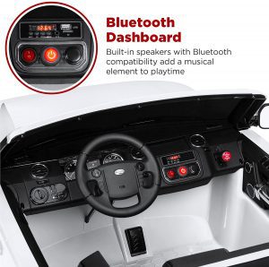 Behold the cutting-edge technology embedded within the sleek design of the Land Rover Ride toy car, as showcased by its futuristic Bluetooth-enabled dashboard