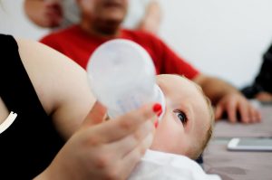 Milk are fortified with vitamin c, b12. These vitamins are found in breast milk, powder milk and supplements to help increase baby birth weight. Read more about weight in babies here. baby drinking from the bottle