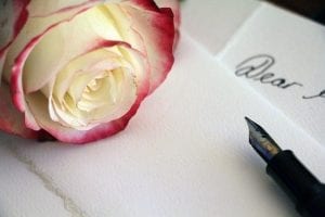 A rose and a love letter can go a long way.