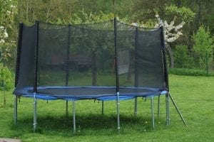 black trampoline with net enclosure
