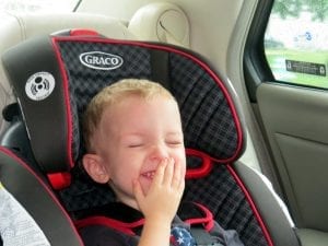 Car seat - A child laughing while sitting in a car seat. A no-rethread harness is just another way to ensure the baby is cozy in their spot. A no-rethread harness implies you can move the straps up and down without rerouting them through the back. Car Seat