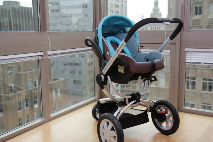 A stroller will keep the baby safe and comfortable.