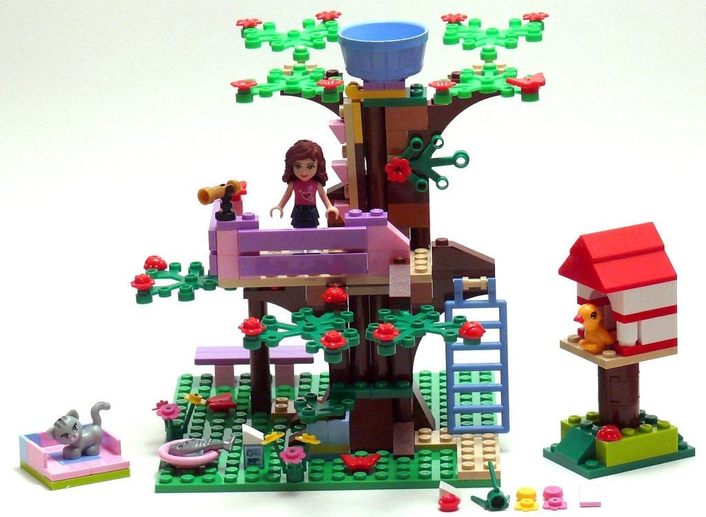 A LEGO Friends sets featuring a treehouse with accessories, a mini-doll figure, and animal figures.