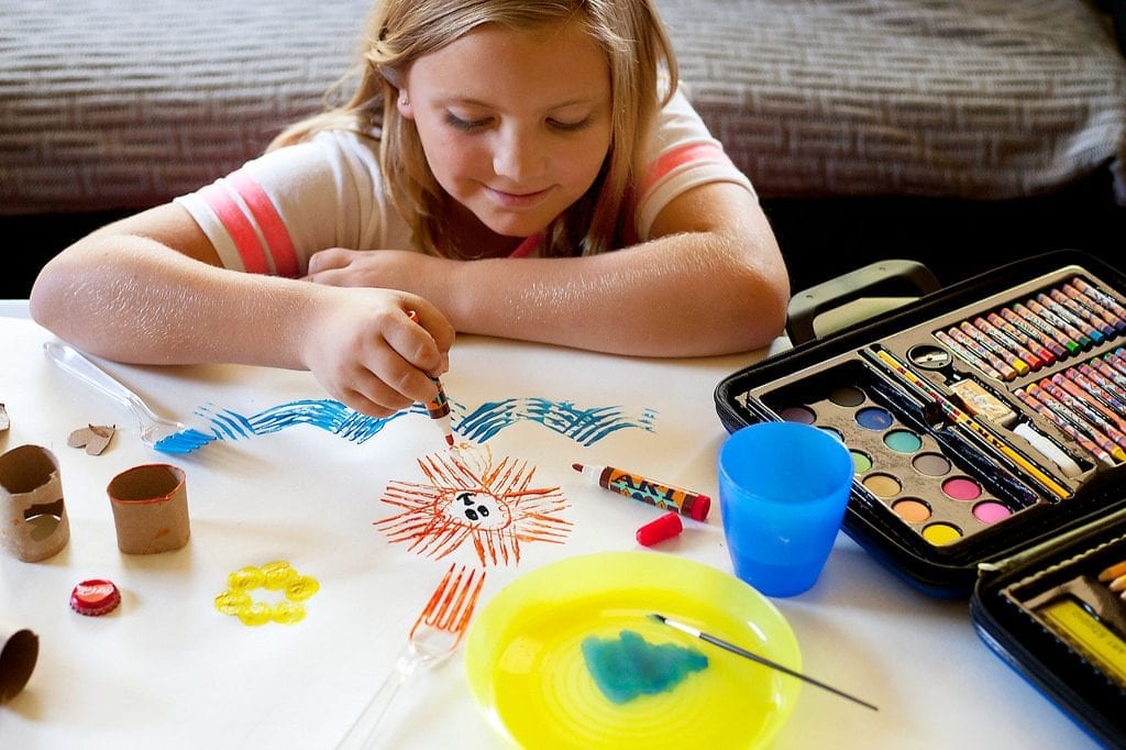 Looking for the best gifts for a 10 year old kid? A kid painting waves and the Sun yung water color. This might be one of the best gifts you can give to your 10 year old girl.