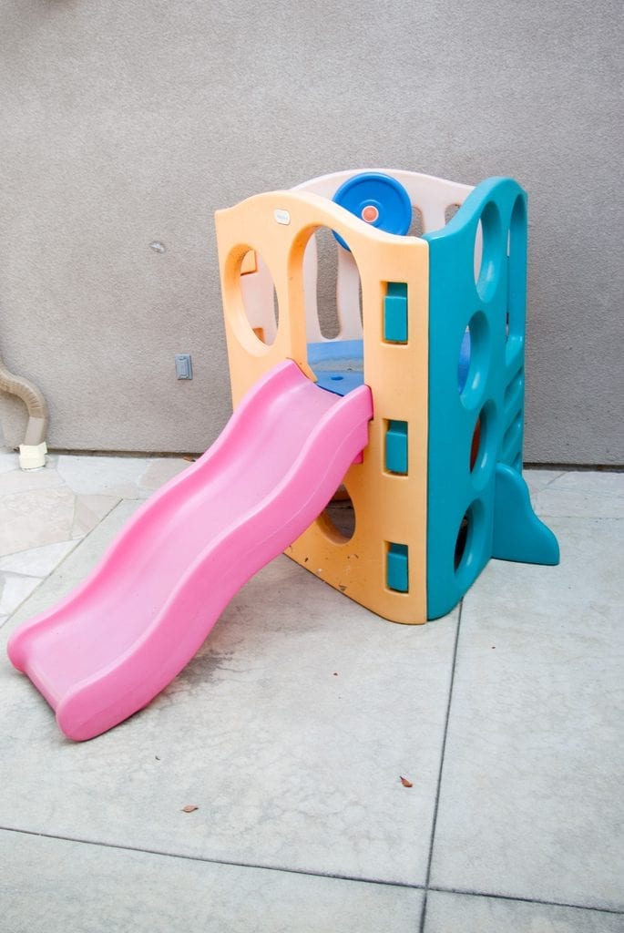 This slide is all climb. It doesn't have a ladder, but instead a rock wall to go to the slide.