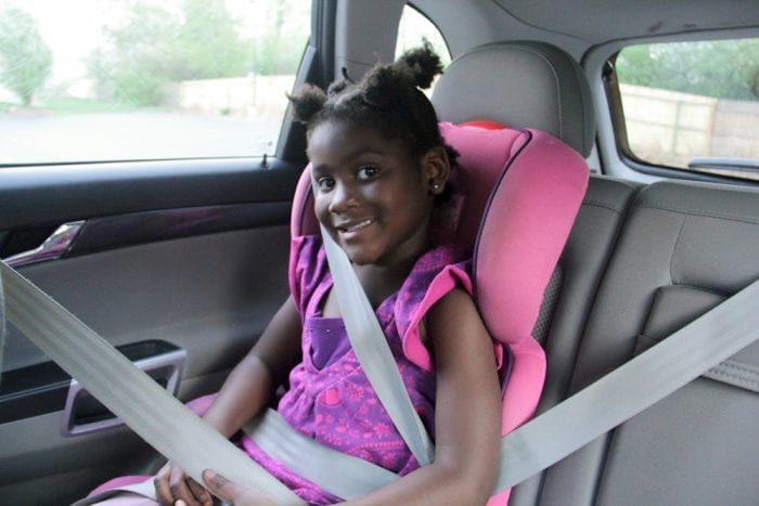 A child sitting inside the car