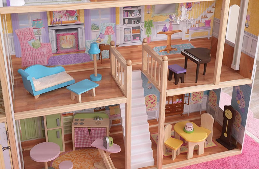 it has wooden dollhouse furniture and accessories.