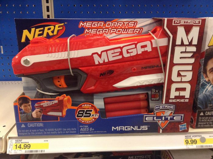 A red Nerf gun with some description and picture on the box.