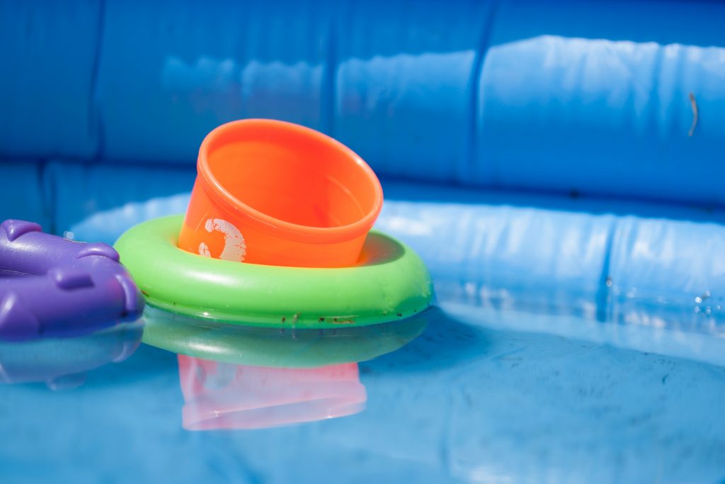 best pool for kids - This is an inflatable pool that has quite a few activities for your children and their bestfriends, and it’s all for around $50. This pool has ring toss, a water sprayer, a ball toss game, and much more. It’s one of the best pools for your little ones because of all that it can do.