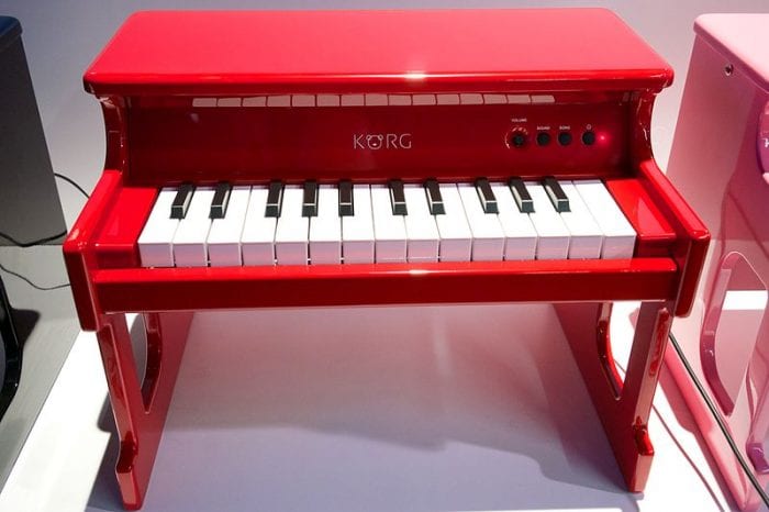 An elegant red piano for kids