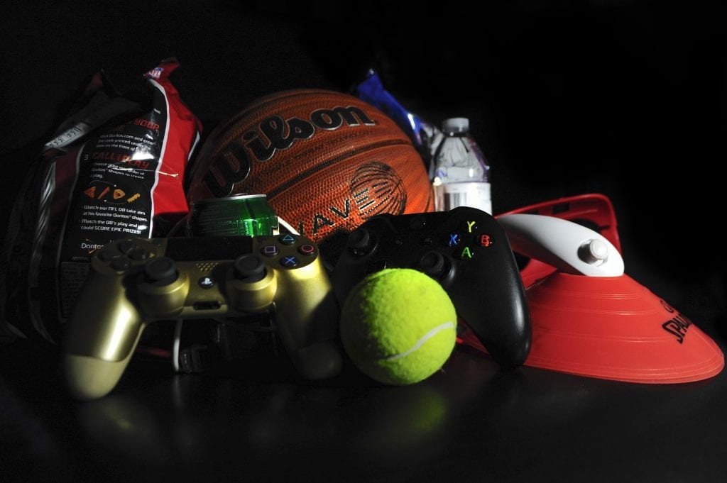 Discover an exceptional collection of toy items catered to teens or young adults, featuring a basketball, tennis ball, PlayStation controller, and many more.