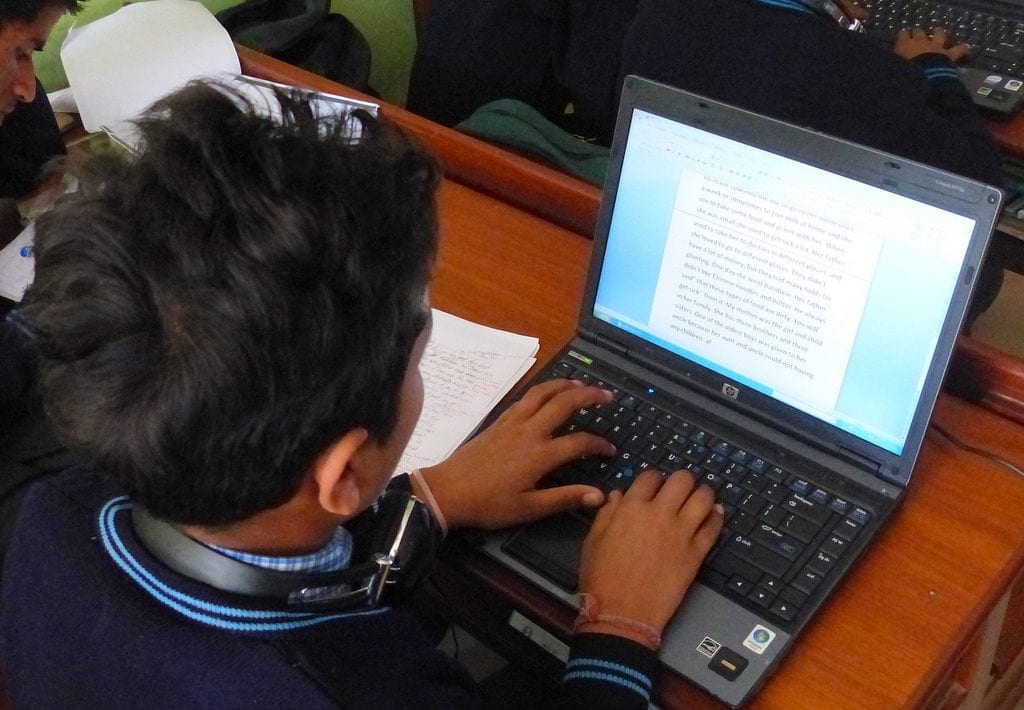 Teens like this boy likes using the computer.