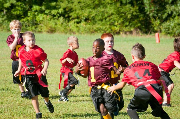 youth are playing without helmets