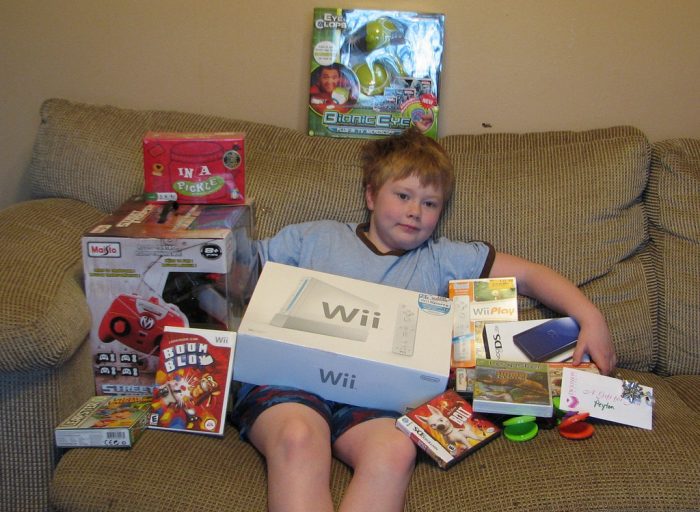 child holding wii 