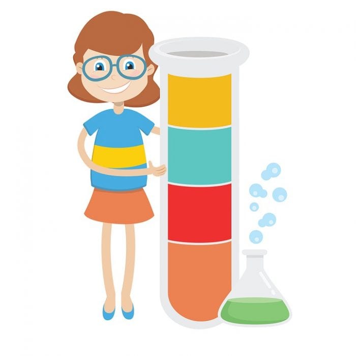 a girl with glasses is smiling while standing beside a colorful glass tube