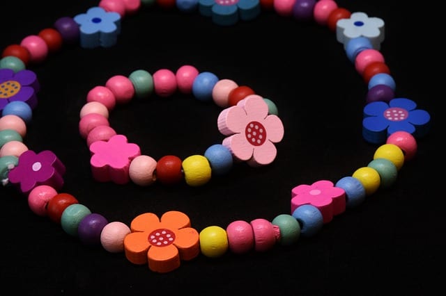 A colorful bracelet and necklace made up from small beads