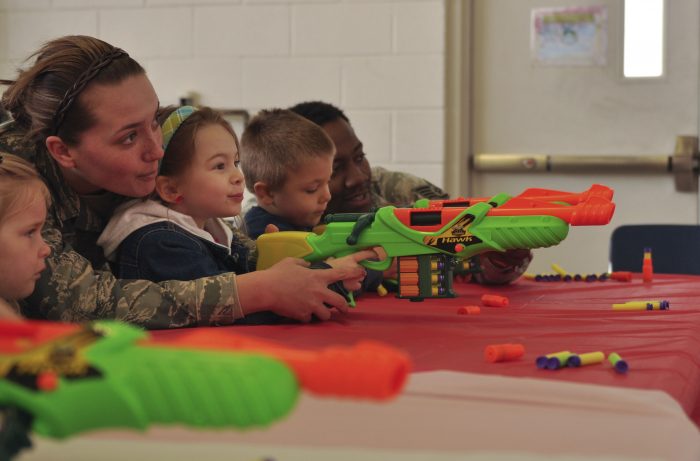 Kids playing with their parents