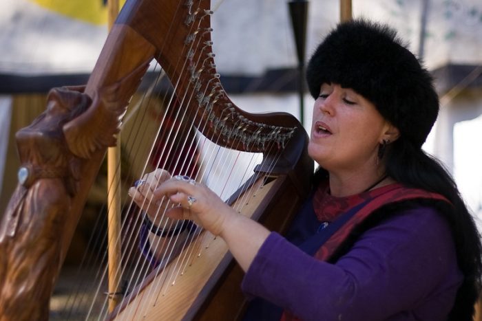 lady playing lyre harp