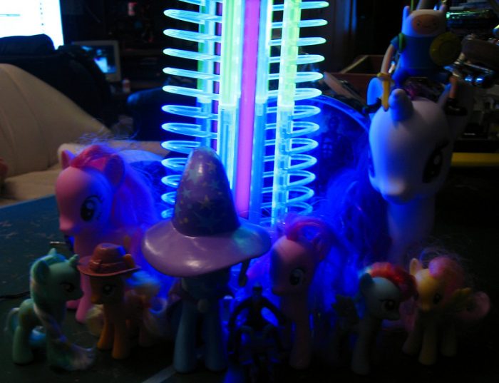 Cute spring rocking horses glowing at night with their magical colors, nice forms, and best features.