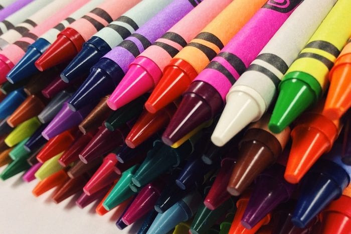 a pile of colorful crayons, which are a great addition to craft sets to give children