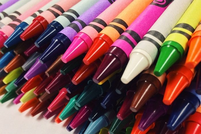 a pile of colorful crayons, which are a great addition to craft sets to give children