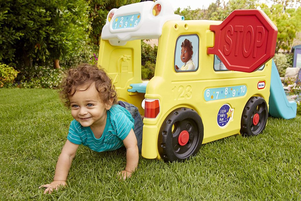 The Wheels on the Bus play structure is complete with a climber and a toddler slide