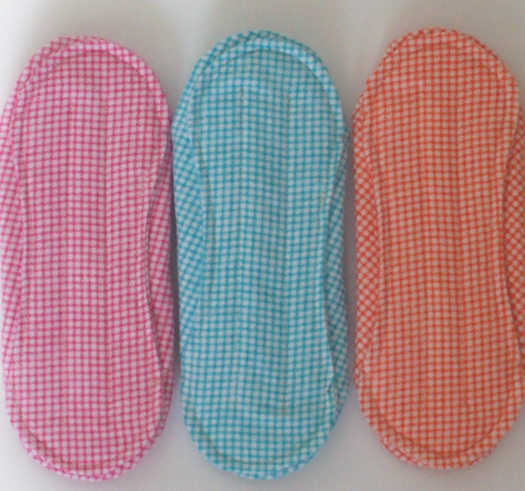 Three checkered cloth postpartum pads 