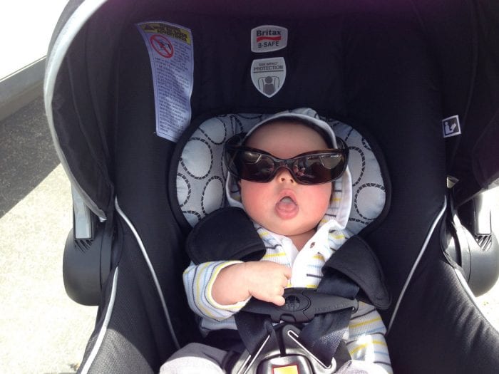 A baby in a Britax car seat