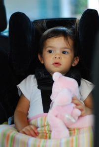 Little girl in the car seat 