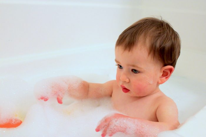 Baby taking a bath