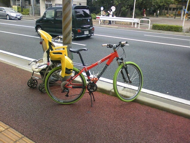 perfect bike seat, great bike seat, colorful bike seat. Bike parking. Free bike parking. Bike in the city. Bike with seat. Bike wheels.