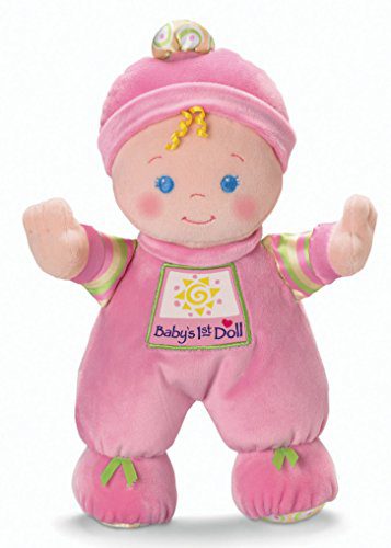 best baby doll- This baby doll can be the best baby doll option. A pink baby doll with blonde hair, hair accessories and a hat, with pink clothes and green ribbons, with two hands upwards