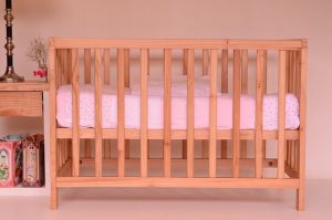 American-produced crib with comforters