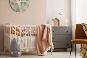 One of the best baby cribs with blankets and baby toys.