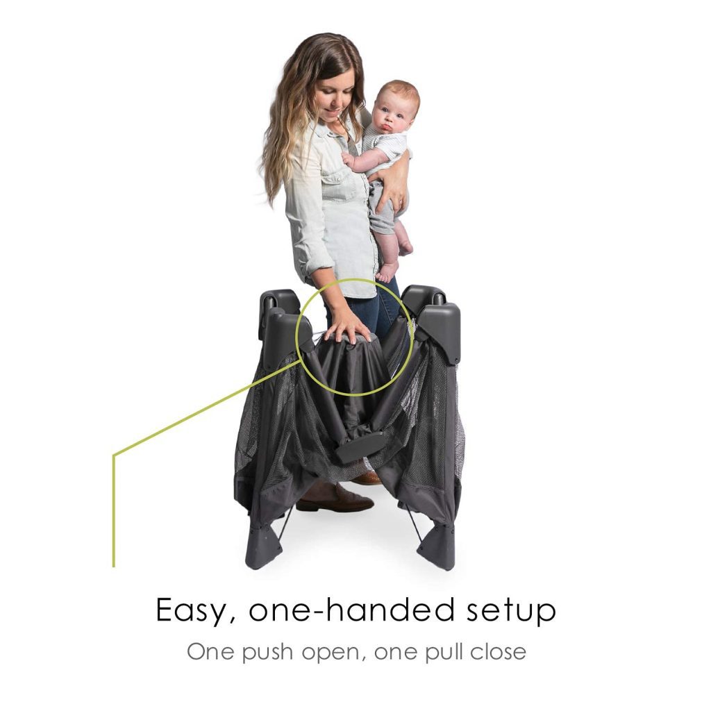 A mommy and a baby setting up the crib