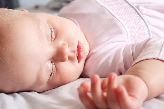 13-month old baby taking a nap
