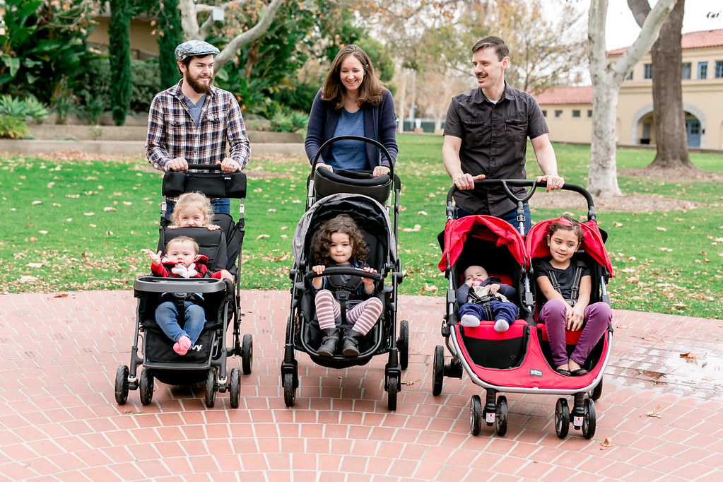 Parents together with their kids who are on wonderful strollers