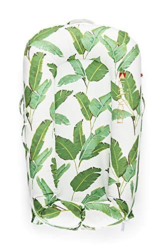 DockATot in green and white design. This DockATot looks comfy and fresh. Your baby will love sleeping in DockATot.