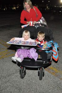 Double strollers are very convenient for parents and caregivers taking care of two kids
